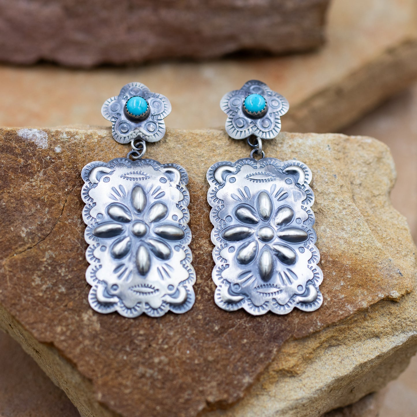 Sterling Silver Repoussé Stamped Concho and Turquoise Dangle earrings by P. Yazzi