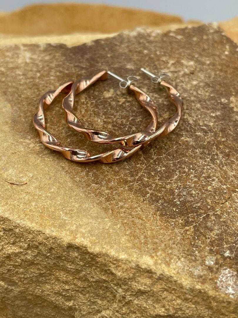 Copper Hoops with sterling silver posts by artist Elaine Tahe