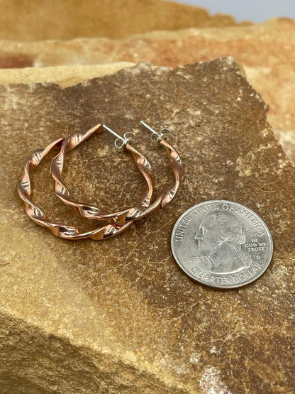 Copper Hoops with sterling silver posts by artist Elaine Tahe