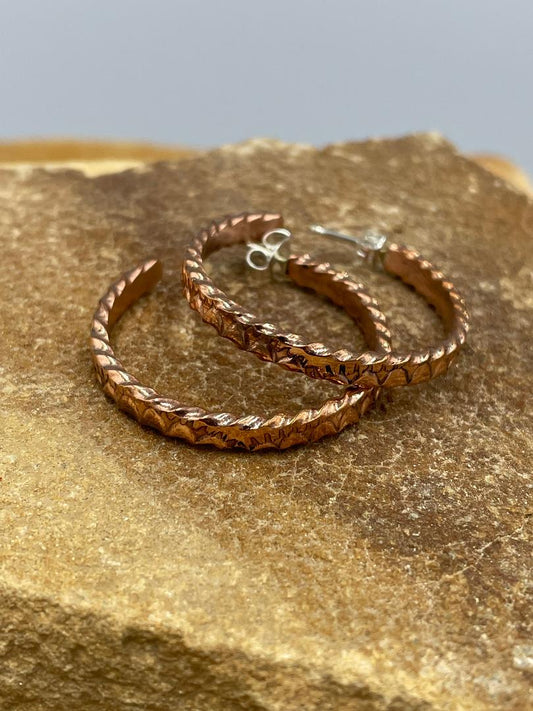 Copper Hoops with sterling silver posts by artist Elaine Tahe