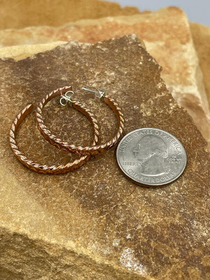 Copper Hoops with sterling silver posts by artist Elaine Tahe